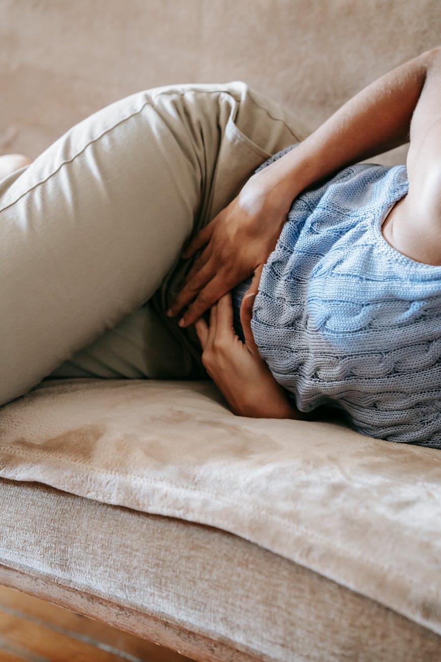 woman suffering from a stomach pain