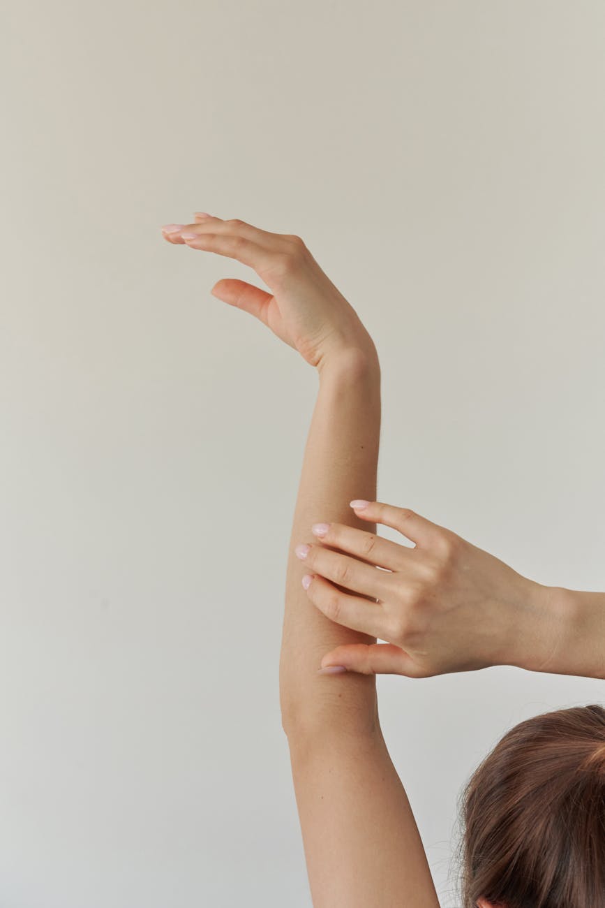 arms raised above head